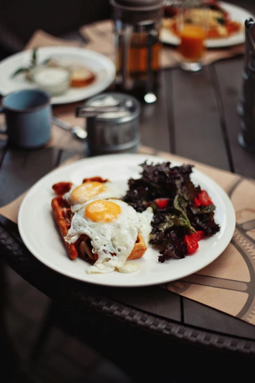 a close up of a plate of food on a table, pexels contest winner, hearty breakfast, al fresco, square, eggs