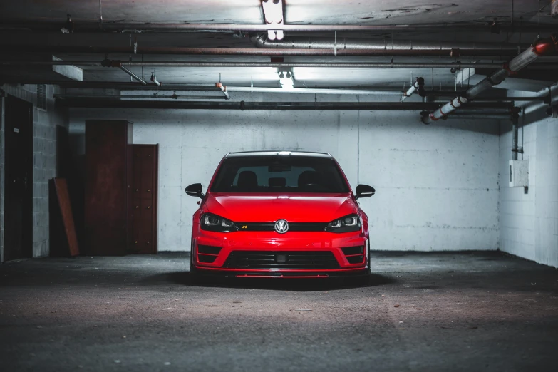 a red car parked in a parking garage, pexels contest winner, wrx golf, avatar image, red horns, instagram picture