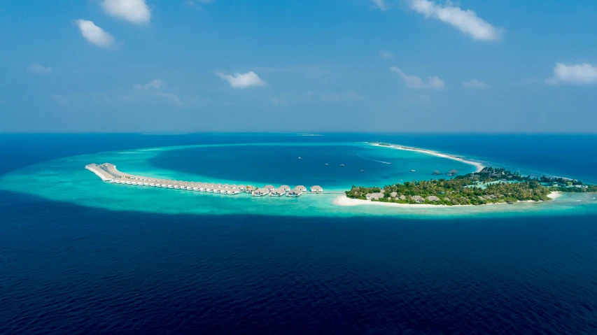 an island in the middle of the ocean, by Julian Allen, pexels contest winner, hurufiyya, bvlgari, resort, panoramic view, thumbnail