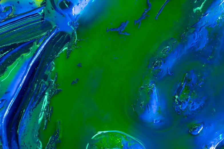 a close up of a green and blue painting, an album cover, inspired by Richard Gerstl, lyrical abstraction, artstation. view from space, toxic slime, kitbash 3 d texture vibrant, blue bioluminescent plastics
