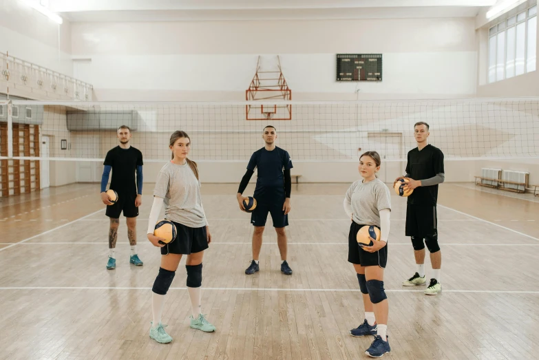 a group of people playing a game of volleyball, a portrait, pexels contest winner, danube school, full body 8k, anna nikonova aka newmilky, local gym, background image