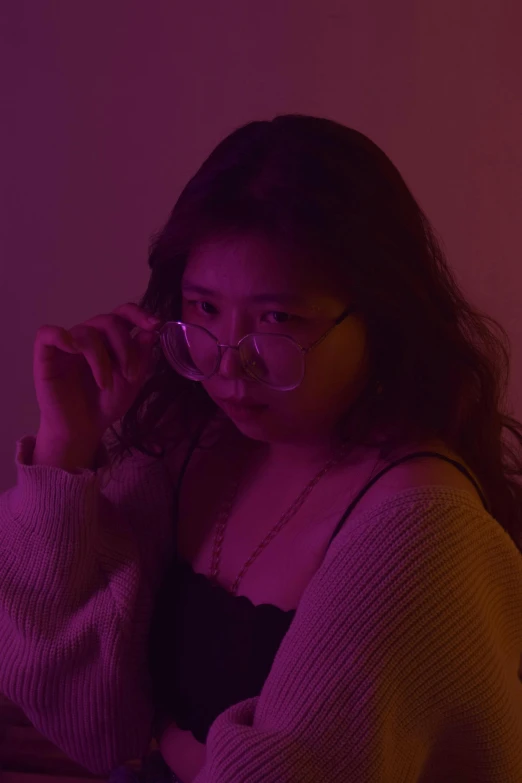 a woman with glasses talking on a cell phone, an album cover, inspired by Kim Jeong-hui, unsplash contest winner, realism, barely lit warm violet red light, 🤤 girl portrait, thicc, panoramic view of girl