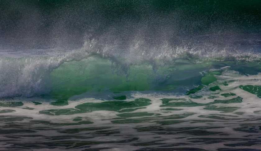 a man riding a wave on top of a surfboard, by Alison Geissler, pexels contest winner, renaissance, green glow, deep texture, an abstract, ocean sprites