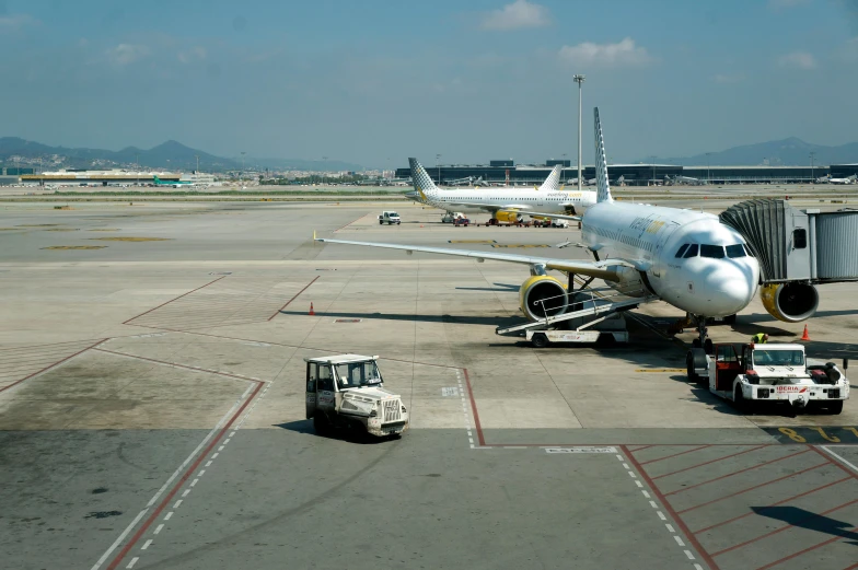 a large jetliner sitting on top of an airport tarmac, by Jang Seung-eop, pexels contest winner, square, gwanghwamun, in 2 0 0 2, very clear picture