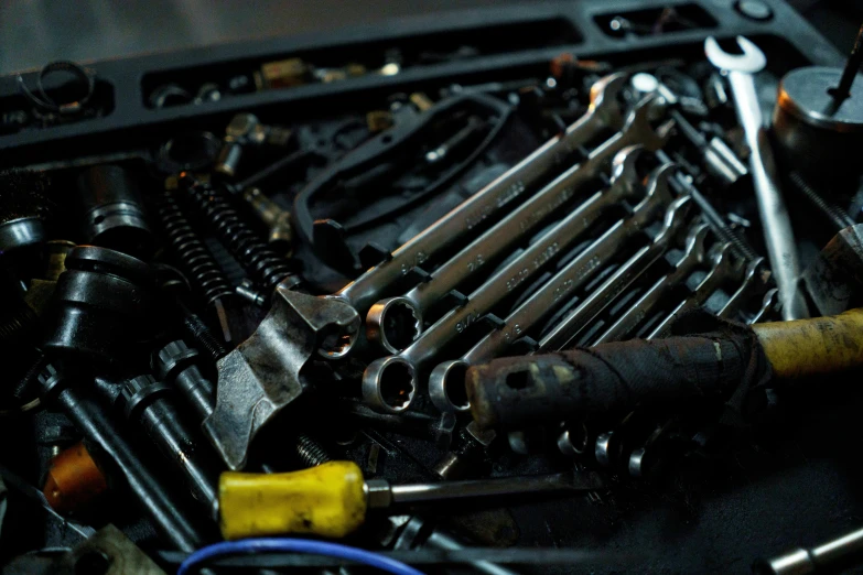 a bunch of tools sitting on top of a table, closeup of car engine, bay area, high quality product image”, maintenance photo