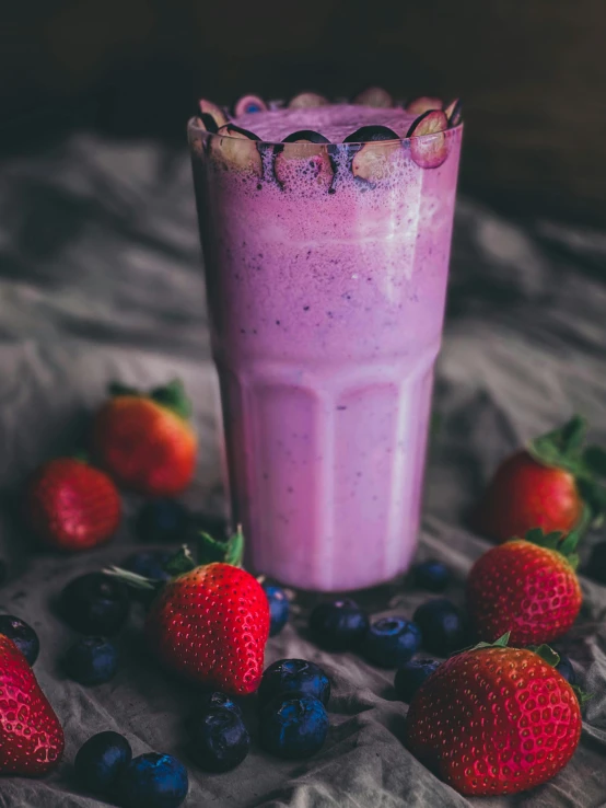 a purple smoothie with strawberries and blueberries, trending on unsplash, renaissance, milkshake, high quality product image”, 0, portrait shot