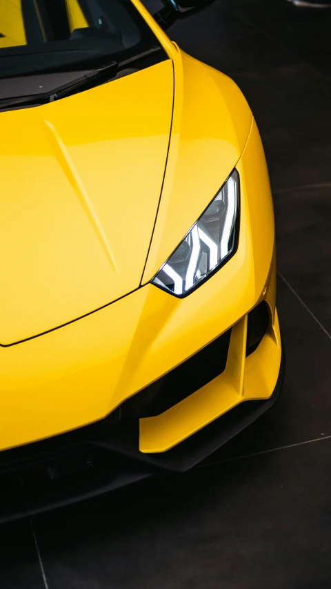 a yellow sports car parked in a showroom, pexels contest winner, triangular face, 8k detail post processing, thumbnail, instagram post