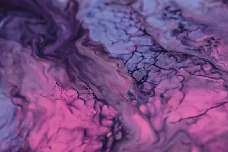 a close up of a painting on a table, unsplash, generative art, purple liquid, fractal veins, pink, abstract album cover