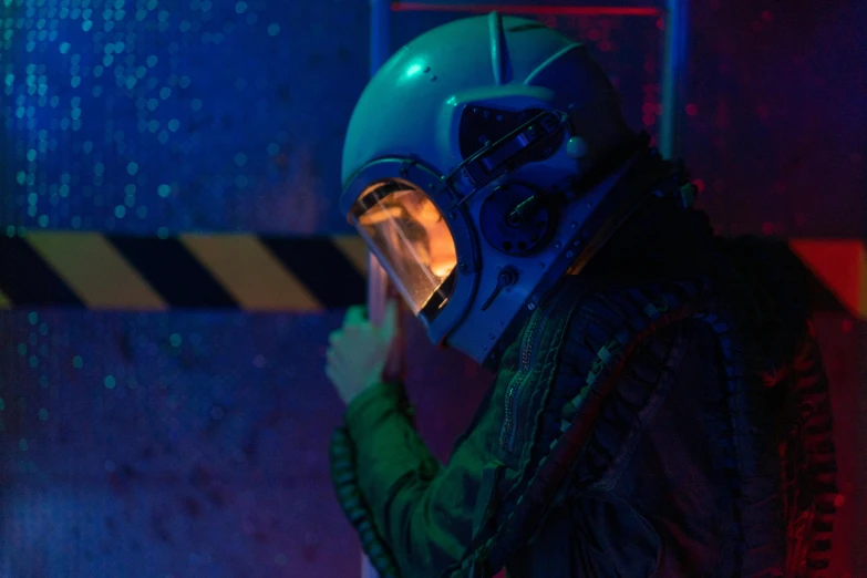 a close up of a person wearing a helmet, cyberpunk art, inspired by Liam Wong, wearing human air force jumpsuit, scene from starship, cyberpunk nightclub, set photo