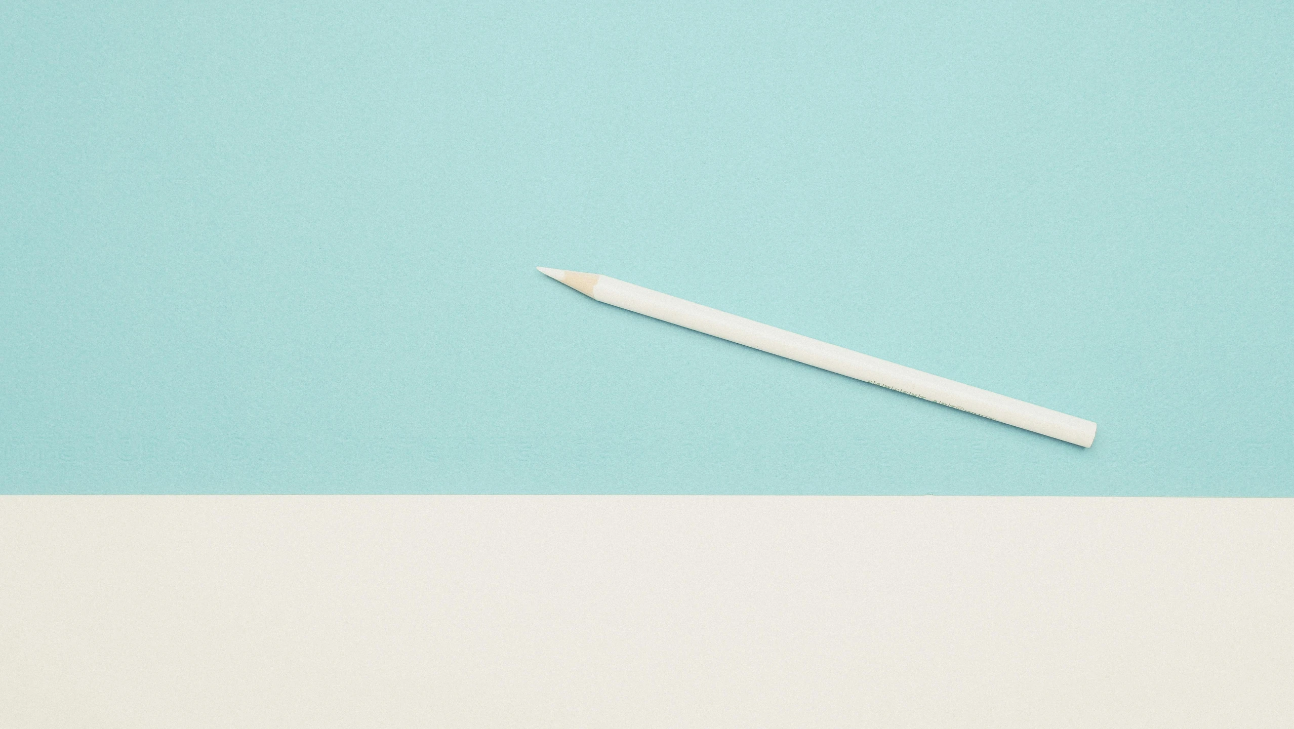 a white pencil sitting on top of a blue and white surface, inspired by Agnes Martin, unsplash, teal paper, clemens ascher, adrian tomine, spear