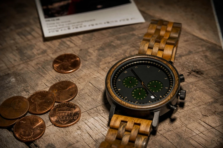 a wooden watch sitting on top of a wooden table, a portrait, by Mathias Kollros, pexels contest winner, coins, copper and emerald inlay, thumbnail, portrait shot 8 k