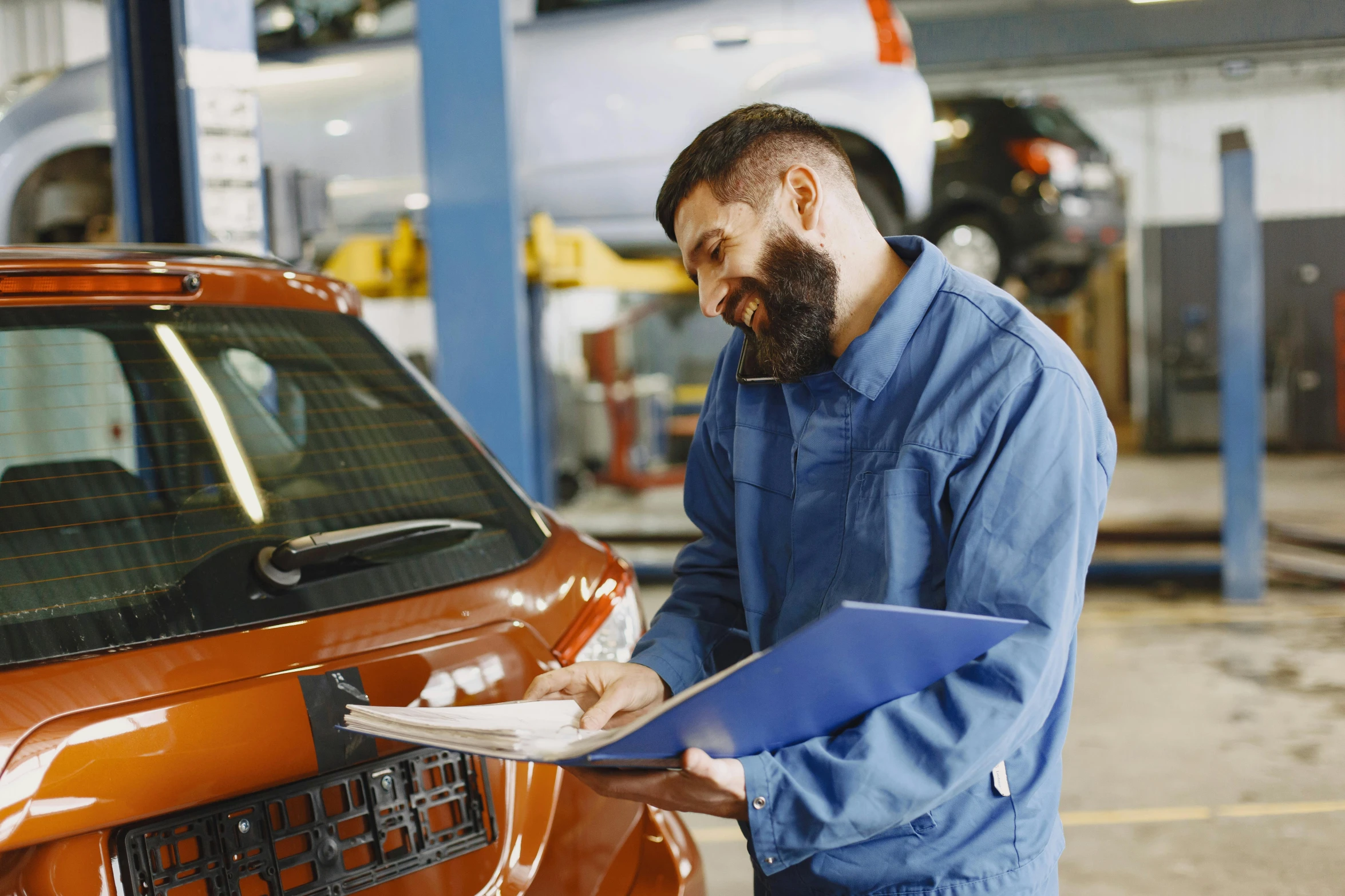 a man standing next to a car in a garage, inspect in inventory image, a brightly coloured, thumbnail, blue print