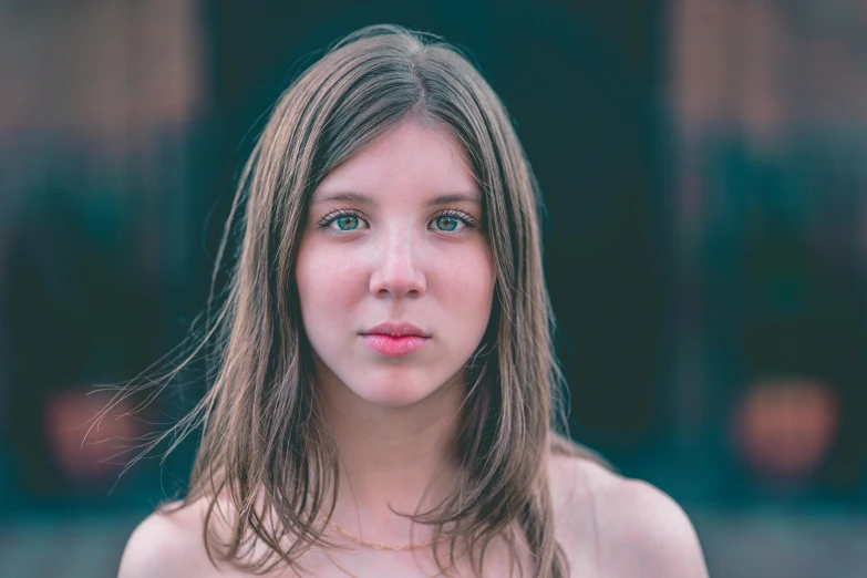a beautiful young woman standing in front of a building, inspired by Elsa Bleda, pexels contest winner, renaissance, square nose, headshot, portrait image