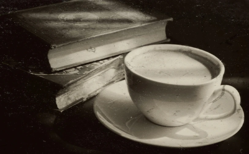 a cup of coffee next to a stack of books, by Katia Chausheva, pexels contest winner, tonalism, milk, 15081959 21121991 01012000 4k, vintage noir, cappuccino