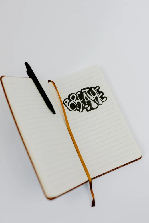 a notebook with a pen on top of it, by Bascove, graffiti, plain background, negative space, on a canva, svg sticker art
