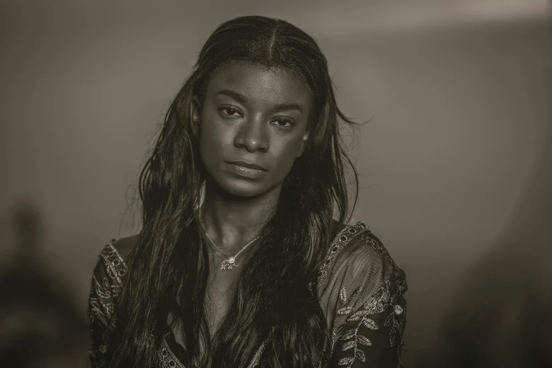 a black and white photo of a woman with long hair, by Dan Frazier, pexels contest winner, renaissance, brown skinned, lorde, actor, young black woman