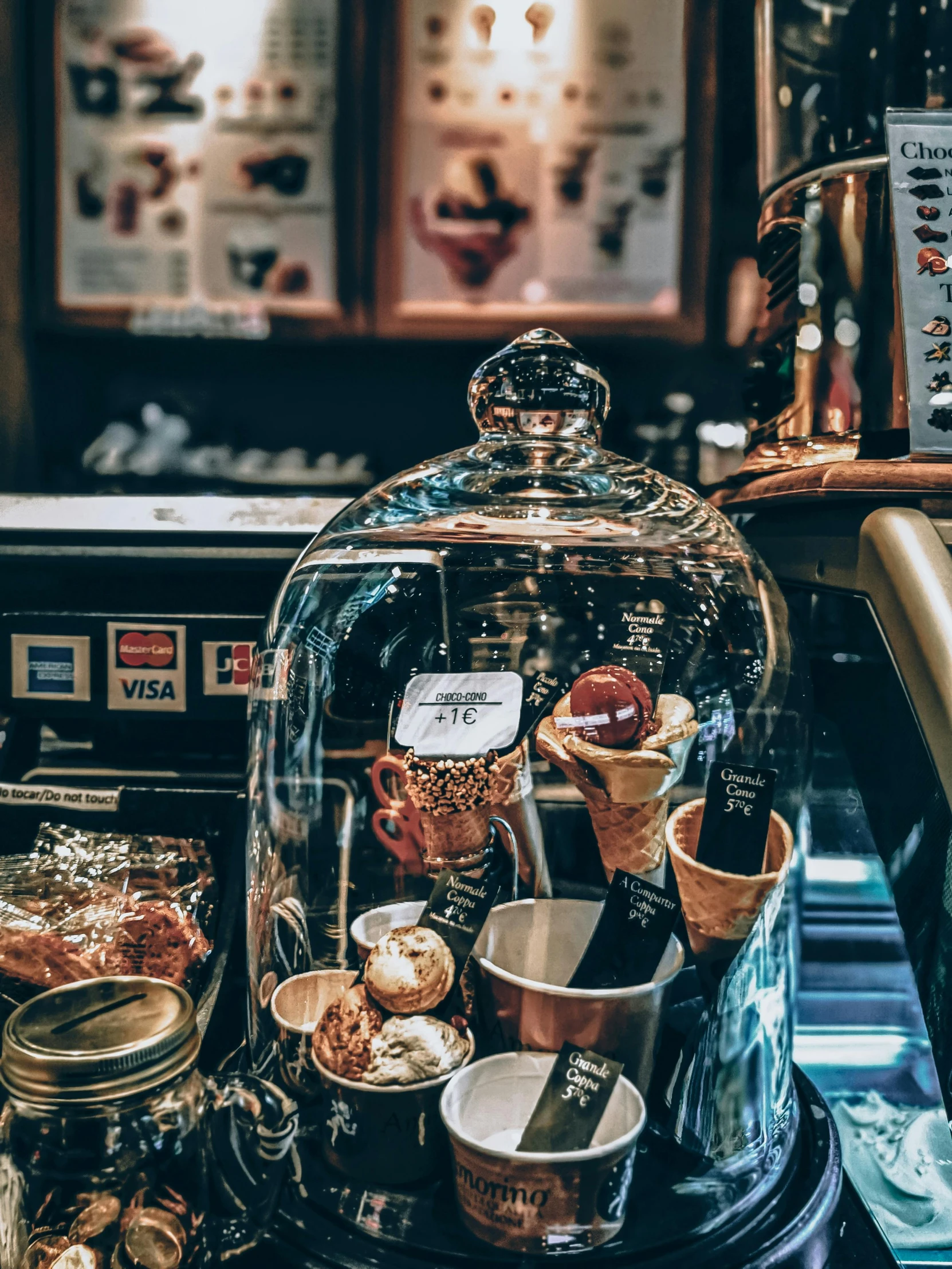 a display case filled with desserts and pastries, a still life, by Julia Pishtar, trending on unsplash, coffee machine, ice cream cone, thumbnail, 2 0 0 0's photo