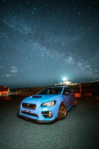 a blue car sitting on top of a road under a night sky, wrx golf, professional photo, sherbert sky, on display