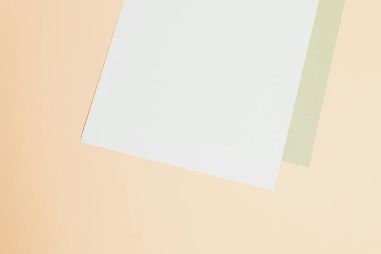 three sheets of paper stacked on top of each other, a minimalist painting, trending on unsplash, pastell colours, detailed product image, ad image, high angle close up shot