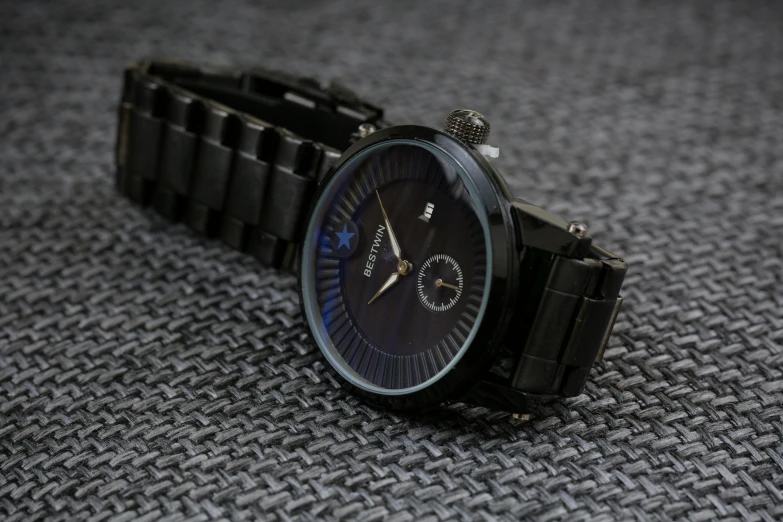 a close up of a watch on a table, hurufiyya, dark matte metal, bautiful, detailed product image, watch photo