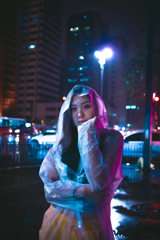 a woman standing in the rain at night, an album cover, pexels contest winner, techwear clothes, asian human, pokimane, futuristic street