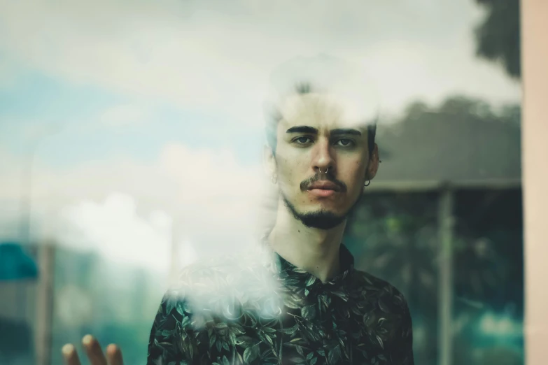 a man standing in front of a window with smoke coming out of his mouth, a picture, inspired by Elsa Bleda, pexels contest winner, hyperrealism, robert sheehan, discord profile picture, outside alone smoking weed, halfbody headshot