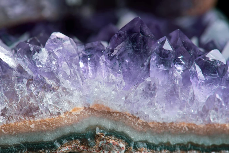 a close up of some very pretty purple crystals, by Adam Marczyński, trending on pexels, closeup of face, mint, high detailed thin stalagtites, focus on full - body