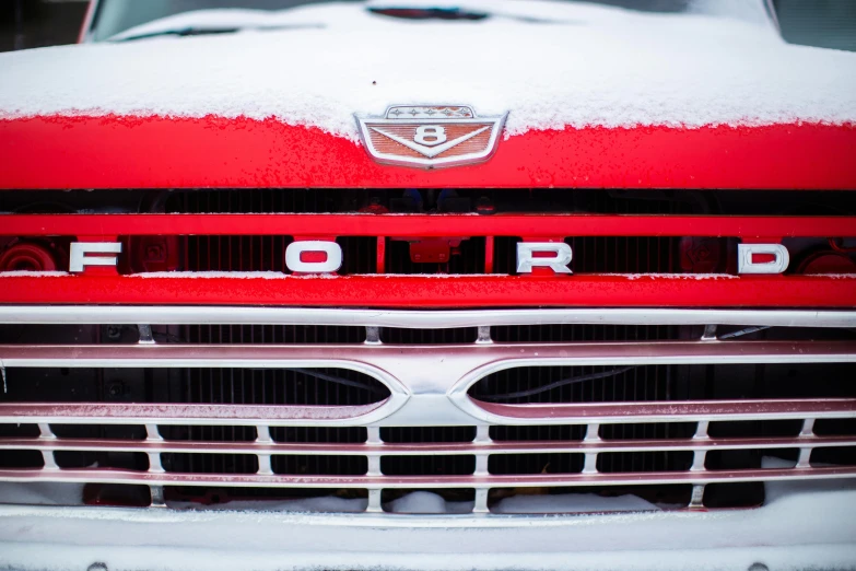 a close up of a red truck covered in snow, by Doug Ohlson, ford, nostalgic 8k, square, grid