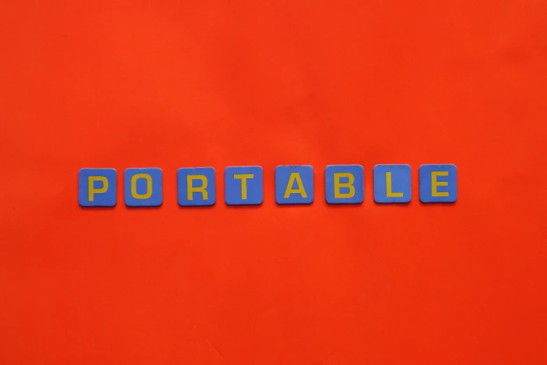 the word portable spelled in blue letters on an orange background, modular item, portapotty, thumbnail, mid - shot