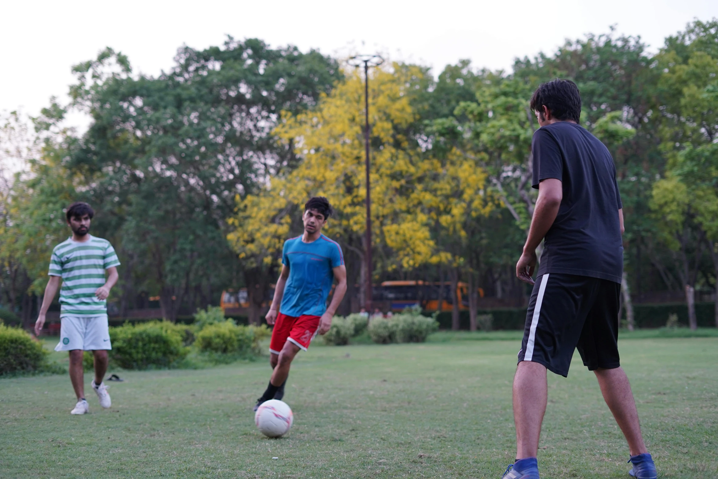 a group of young men playing a game of soccer, a picture, trending on dribble, 15081959 21121991 01012000 4k, green spaces, indiecraft aesthetic, full body focus