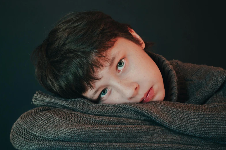 a close up of a person wearing a sweater, by Adam Marczyński, trending on pexels, hyperrealism, cute boy, thoughtful pose, sophia lillis, portrait sophie mudd