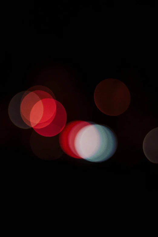 a blurry image of traffic lights in the dark, by Jan Rustem, gradient white to red, circles, ilustration, soft light - n 9