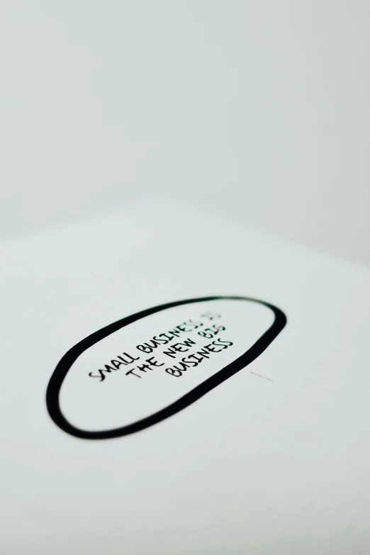 a close up of a surfboard with a sticker on it, an album cover, by Sheikh Hamdullah, black ink on white paper, \'the soul creates, showstudio, found schematic in a notebook