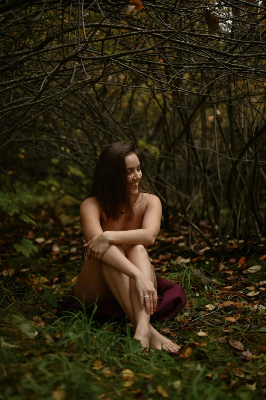 a naked woman sitting on the ground in the woods, a portrait, unsplash, medium format. soft light, october, profile image