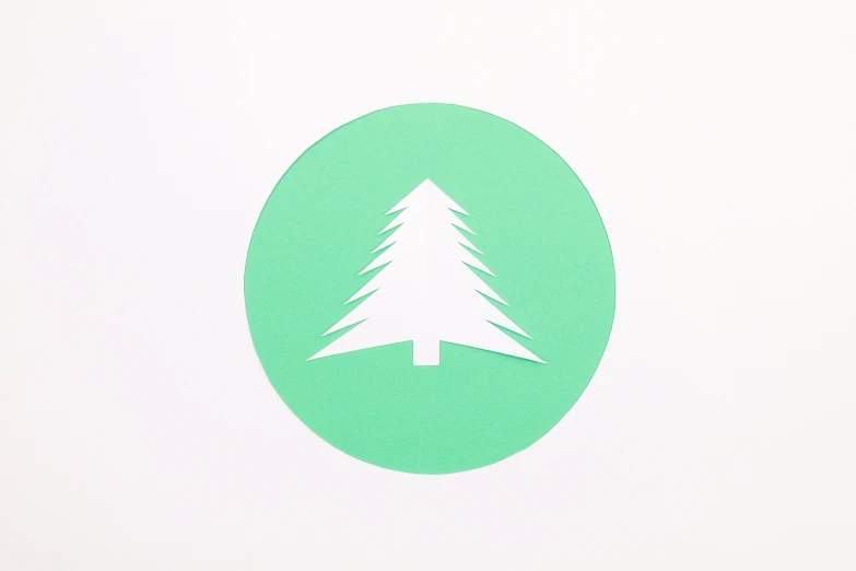 a green circle with a white christmas tree cut out of it, a screenprint, trending on pexels, private press, speedtree, material design, mid view, mint higlights