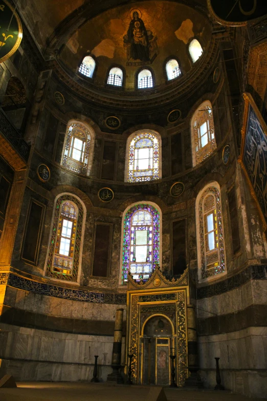 the interior of a church with stained glass windows, a mosaic, inspired by Cimabue, istanbul, rotunda, deity)