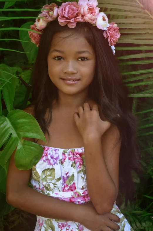a little girl with a flower crown on her head, a picture, inspired by Sophie Gengembre Anderson, sumatraism, posing in waikiki, ready to model, lush surroundings, avatar image