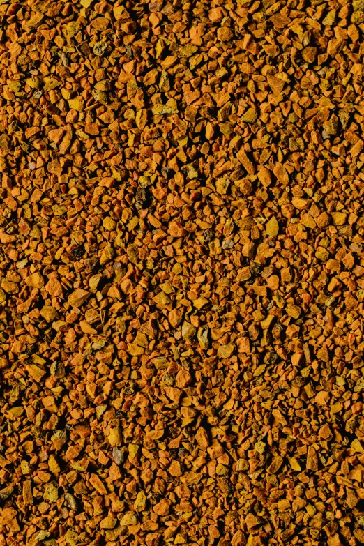 a close up of a pile of dirt, a digital rendering, by Dionisius, renaissance, dark orange, detailed product shot, iron, mustard