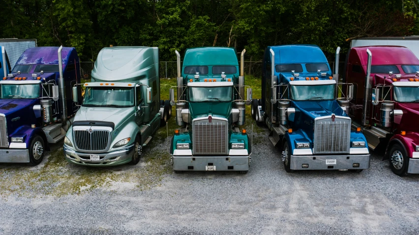 a row of semi trucks parked next to each other, a portrait, profile image, profile picture, fan favorite, frontal shot