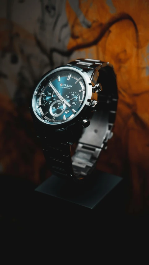 a close up of a watch on a stand, by Adam Marczyński, pexels contest winner, rococo, silver and cool colors, thumbnail, tungsten, product introduction photo