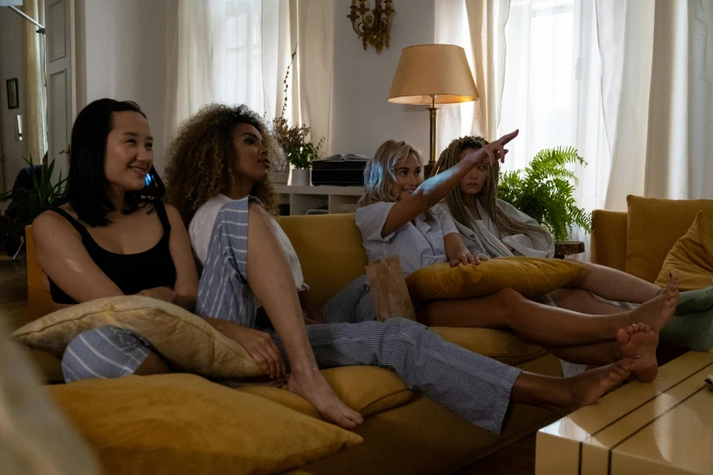 a group of women sitting on top of a couch, pexels, happening, movie footage, fan favorite, blonde women, ( ( theatrical ) )