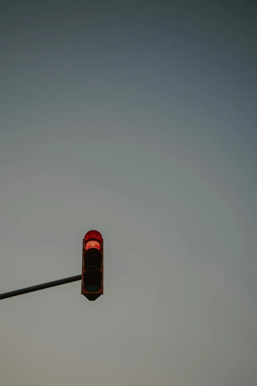 a red traffic light sitting on the side of a road, by Tobias Stimmer, unsplash, postminimalism, square, 15081959 21121991 01012000 4k