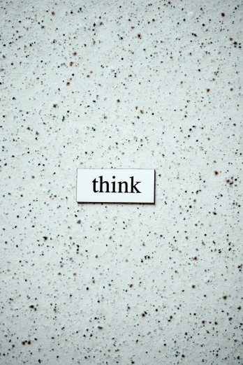 a white sign with the word think on it, by Niko Henrichon, trending on unsplash, gray concrete, thumbnail, foam, intelligence