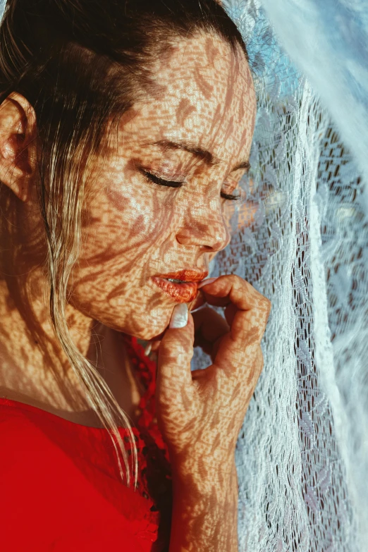 a woman in a red dress eating a piece of pizza, inspired by Elsa Bleda, pexels contest winner, hyperrealism, lace veil, covered in water drops, sunlight filtering through skin, red mesh in the facede