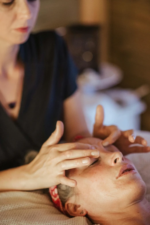 a woman getting a facial massage at a spa, by Jessie Algie, hands shielding face, thumbnail, seasonal, skye meaker