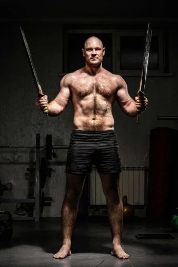a shirtless man holding two swords in his hands, a portrait, by Adam Marczyński, local gym, a portrait of gordon ramsay, strong man, holding pdw