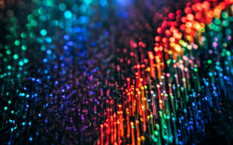 a bunch of lights that are on top of a table, a microscopic photo, by Jan Rustem, pexels, holography, rainbow road, rich vibrant detailed textures, close up bokeh hiperrealistic, fiber optic hair