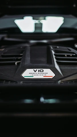 a close up of the engine of a car, an album cover, inspired by Romano Vio, unsplash, the last v 8 interceptor, bios chip, veneno, c 10.0