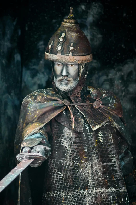 a man dressed in armor holding a sword, a bronze sculpture, inspired by Robert Walker Macbeth, neo-figurative, painted portrait of rugged odin, hand painted textures on model, man portrait made out of ice, scandinavian / norse influenced