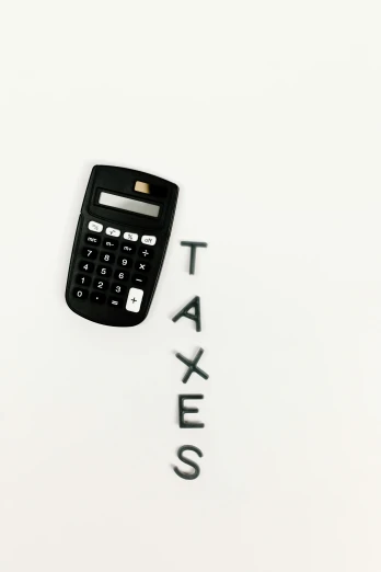 a calculator with the word taxes written on it, an album cover, by Gavin Hamilton, pexels, conceptual art, 2 5 6 x 2 5 6 pixels, minimalistic, pittsburgh, avatar image